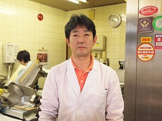 店主の白井さんの写真